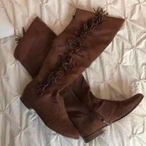 Knee high shade boots.